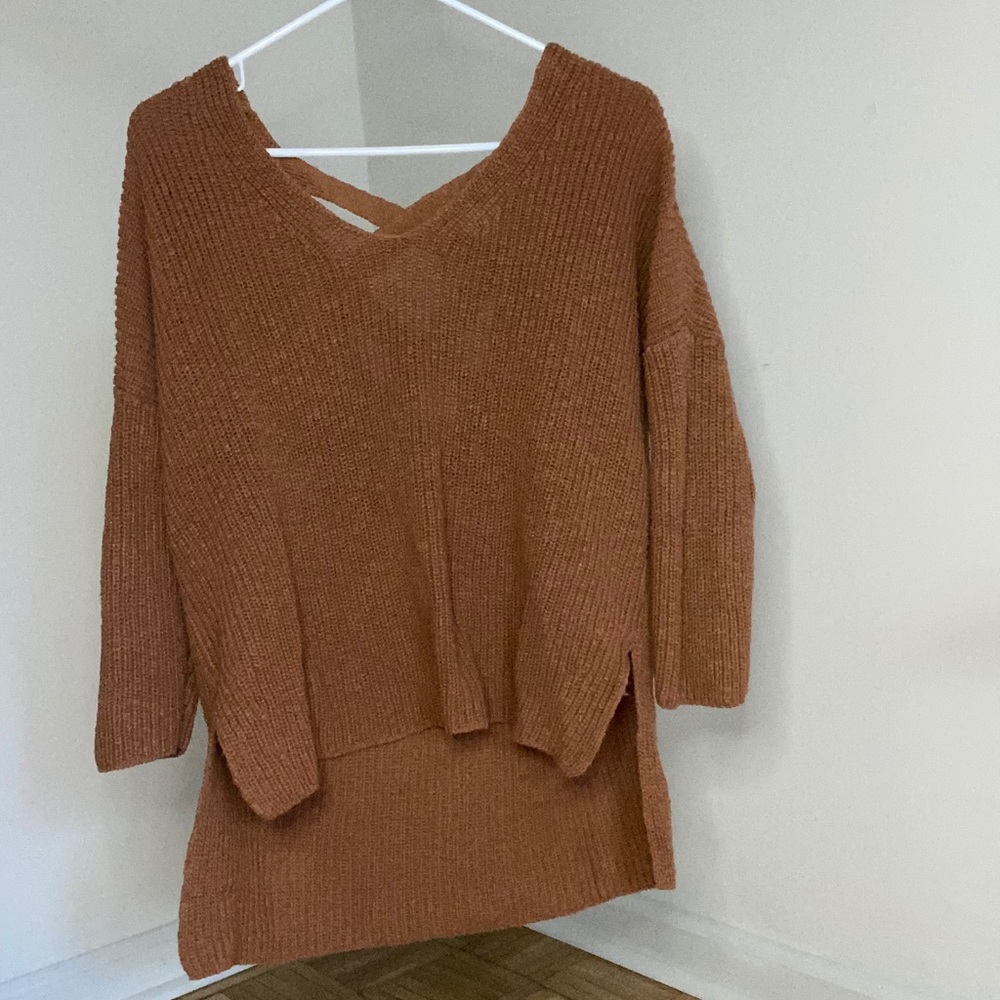 Tan sweater with accent pattern on the back